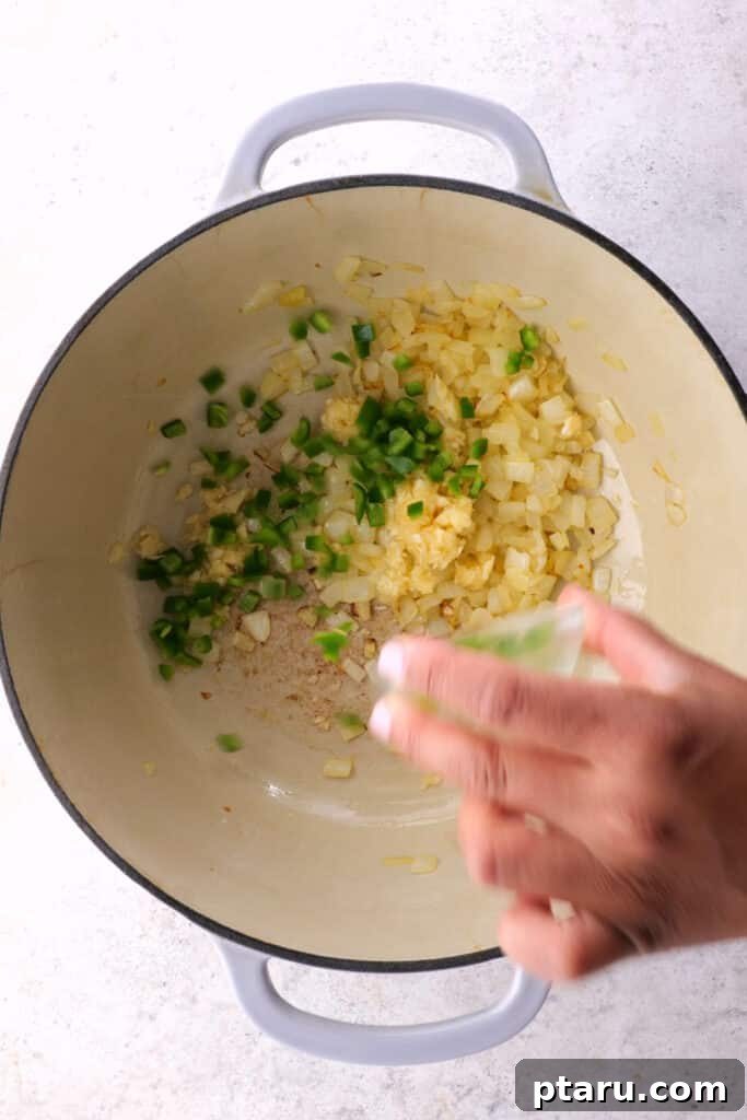 Ultimate Chili Con Carne 4 Step 1: Sautéing chopped onions in olive oil until golden brown.