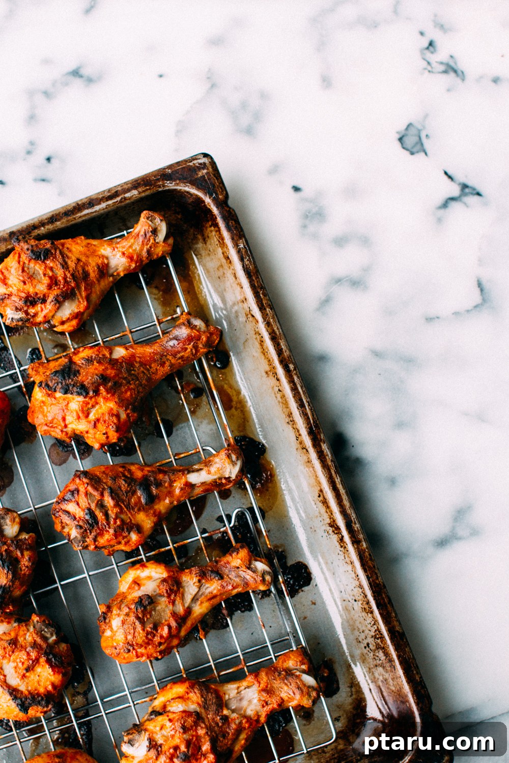 Succulent Baked Tandoori Chicken 4 Oven-Baked Tandoori Chicken recipe served with fresh herbs