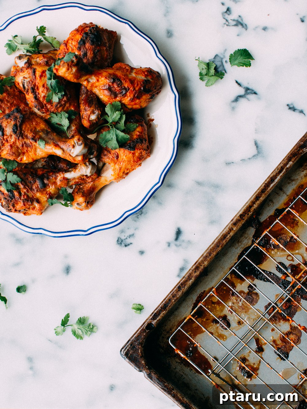 Succulent Baked Tandoori Chicken 5 A vibrant platter of oven-baked Tandoori Chicken, ready to be served