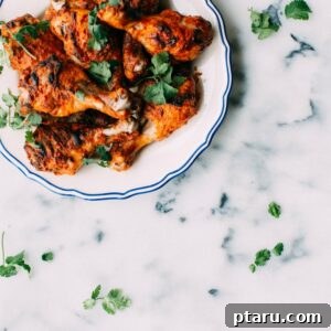 Baked Tandoori Chicken, showcasing its crispy skin and juicy interior
