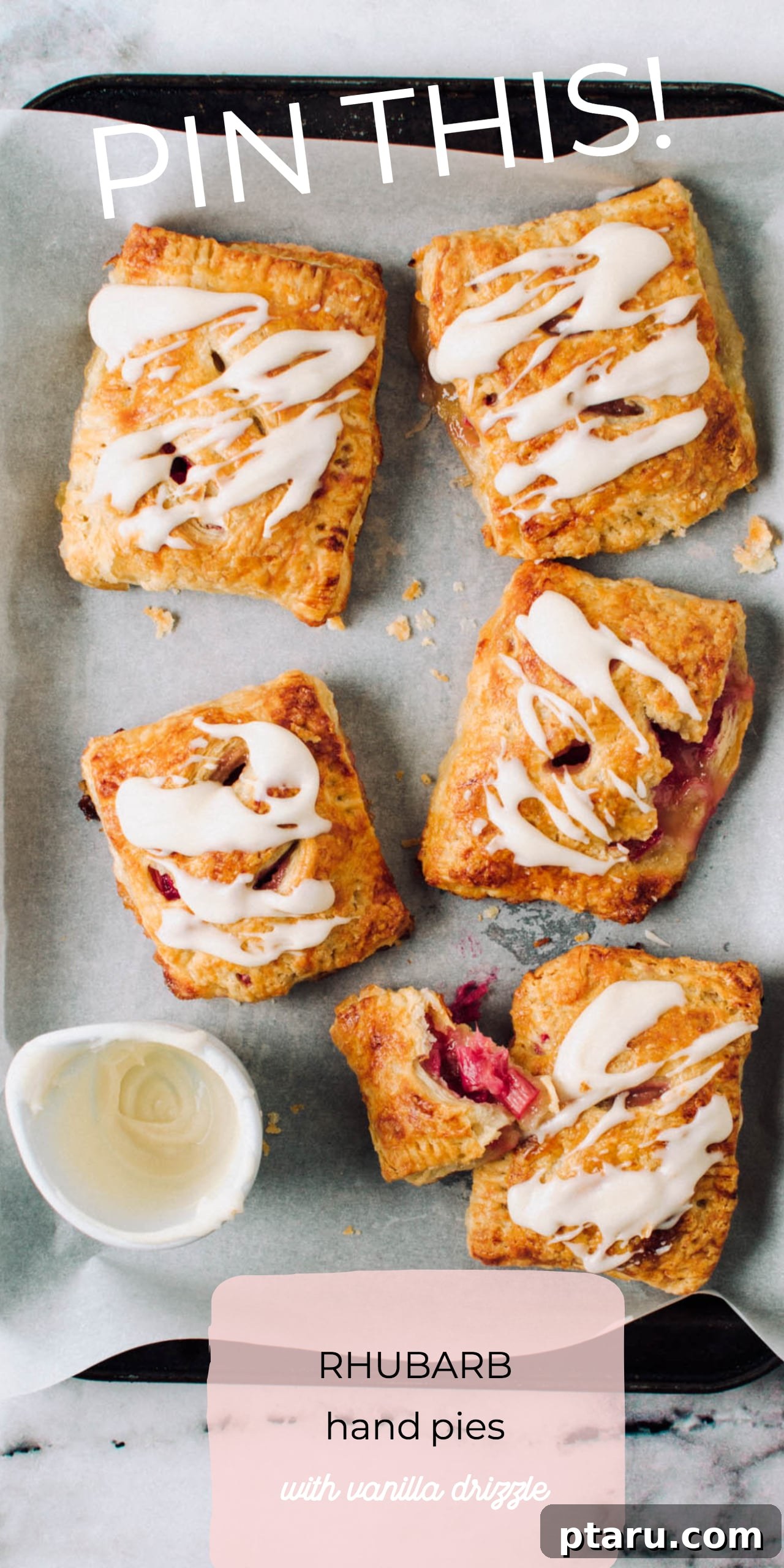 Flaky Rhubarb Turnovers with Vanilla Glaze 4 Two perfectly baked Rhubarb Hand Pies with white vanilla drizzle, resting on a white platter, inviting a delicious bite.