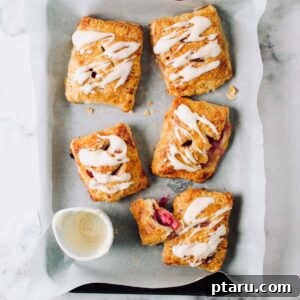 Rhubarb hand pies on a tray.