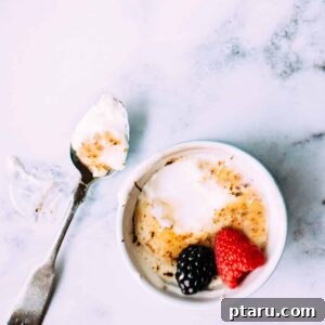 Golden-Topped Yogurt Treat 7 A serving of Yogurt Brulee with a perfectly caramelized top, presented in a small ramekin, ready for enjoyment.