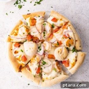 Ocean Harvest Pizza 7 Seafood Pizza on a counter.