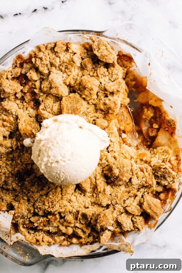 Rustic Brown Sugar Pear Crumble 5 Pear Crisp with a scoop of ice cream on top