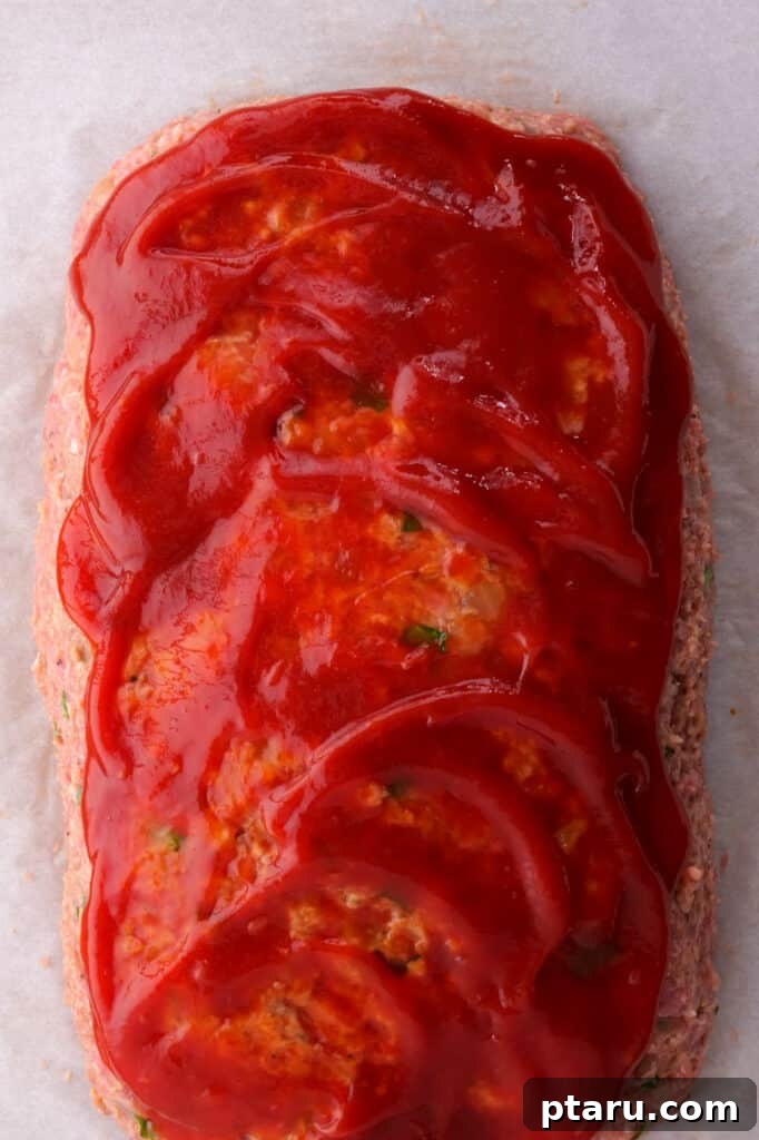 The Meatloaf That Will Turn You Into a Believer 8 meatloaf covered with ketchup