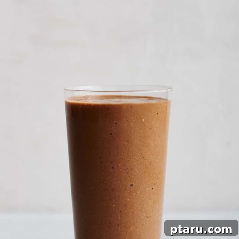 25+ Game-Changing Healthy Smoothie Recipes 13 A refreshing coffee smoothie, artfully presented, suggesting a delicious and energizing blend for a morning or midday pick-me-up.