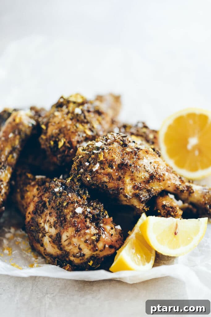 41 Succulent Chicken Drumstick Recipes You Can Make Effortlessly 11 Crispy Baked Italian Drumsticks stacked on parchment paper, fresh out of the oven.