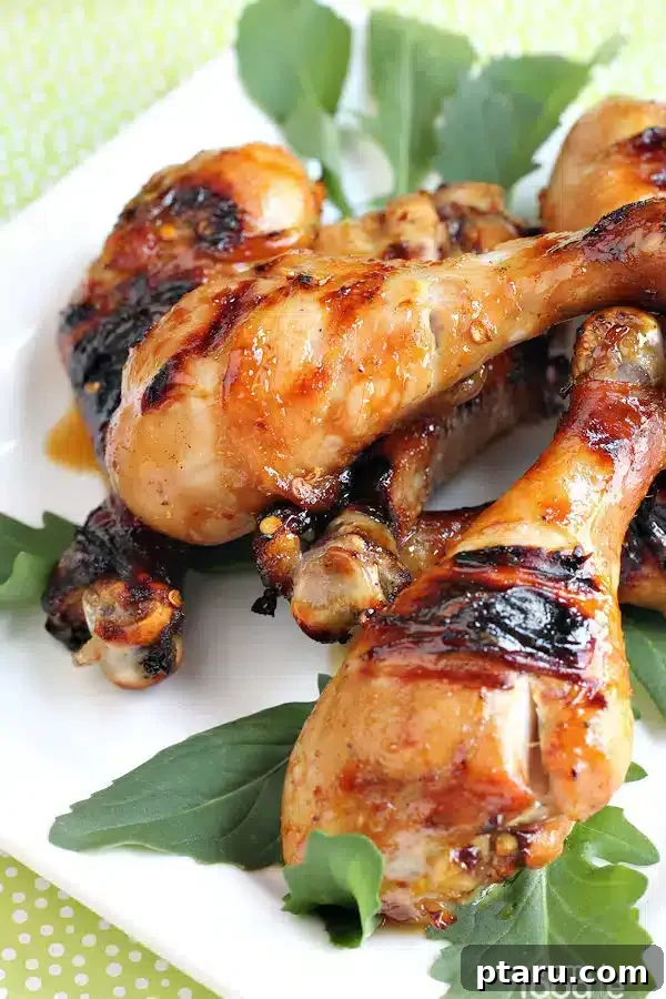 41 Succulent Chicken Drumstick Recipes You Can Make Effortlessly 18 Succulent Asian Chicken Drumsticks served attractively on a plate.