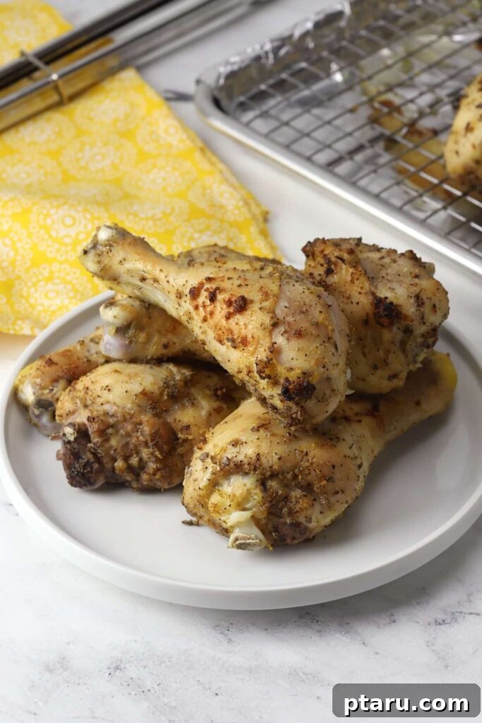 41 Succulent Chicken Drumstick Recipes You Can Make Effortlessly 19 Lemon Pepper Chicken Drumsticks generously plated for a hearty meal.