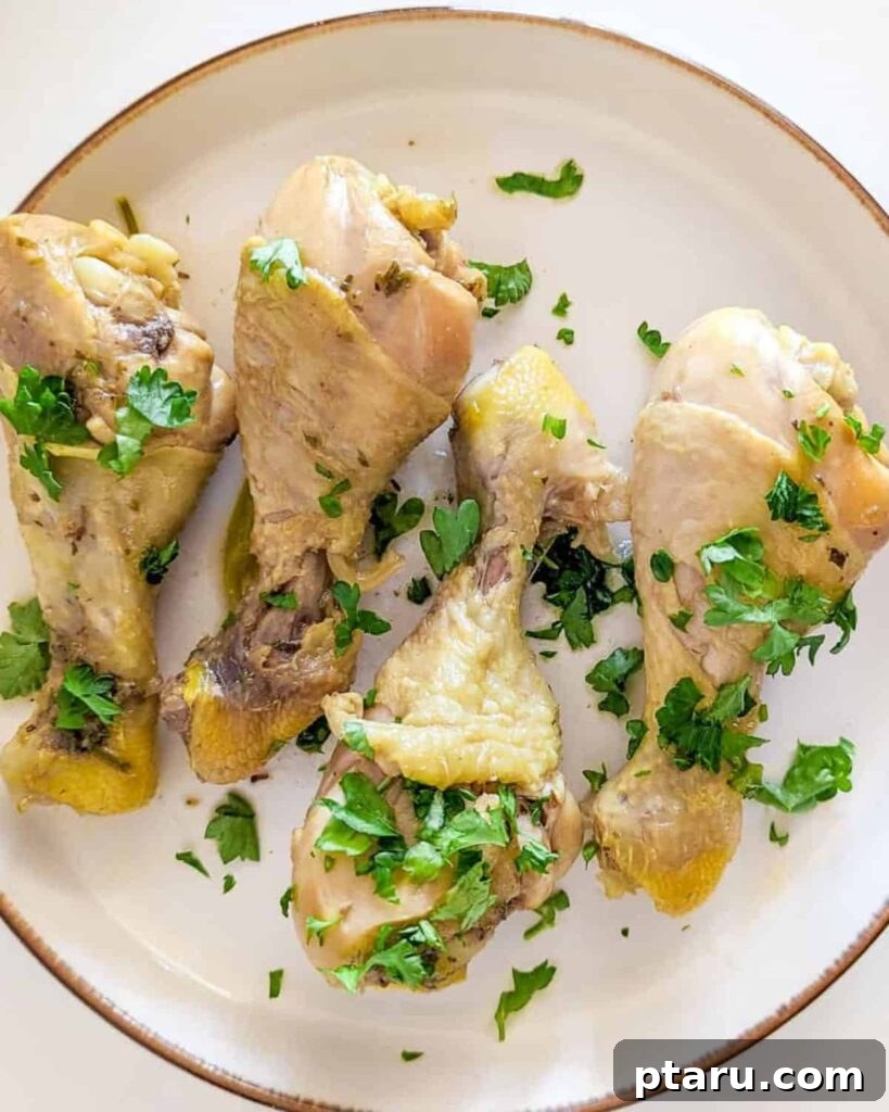 41 Succulent Chicken Drumstick Recipes You Can Make Effortlessly 32 Boiled Chicken Drumsticks served simply on a white plate.