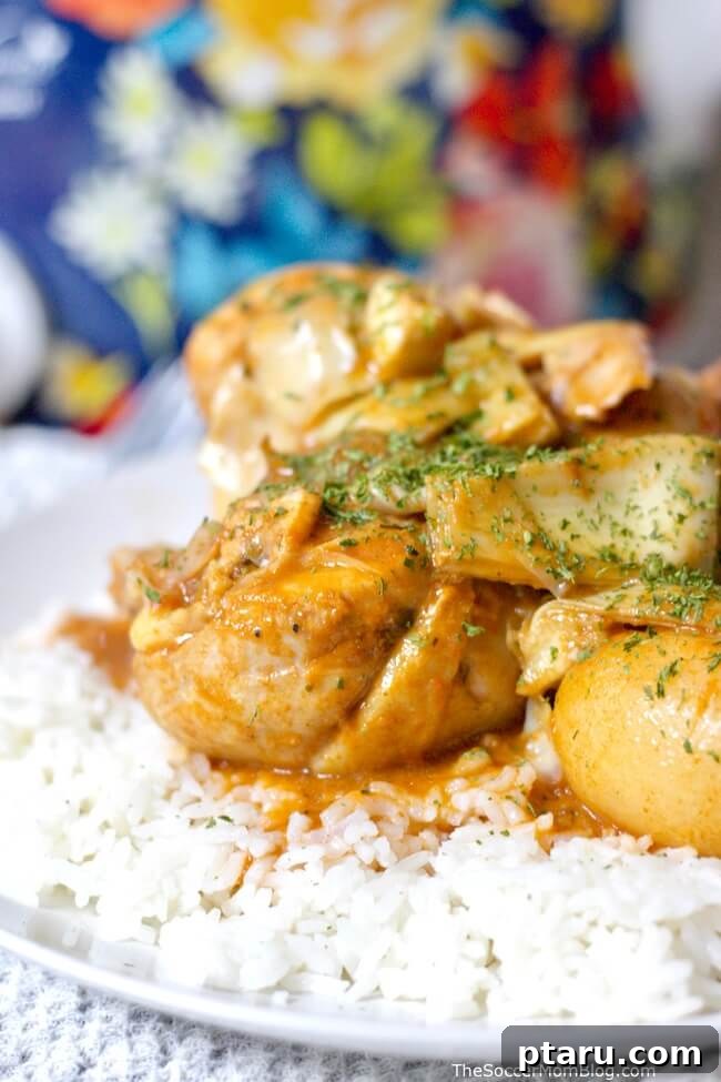 41 Succulent Chicken Drumstick Recipes You Can Make Effortlessly 37 Slow Cooker Italian Chicken and Potatoes served over a bed of rice.