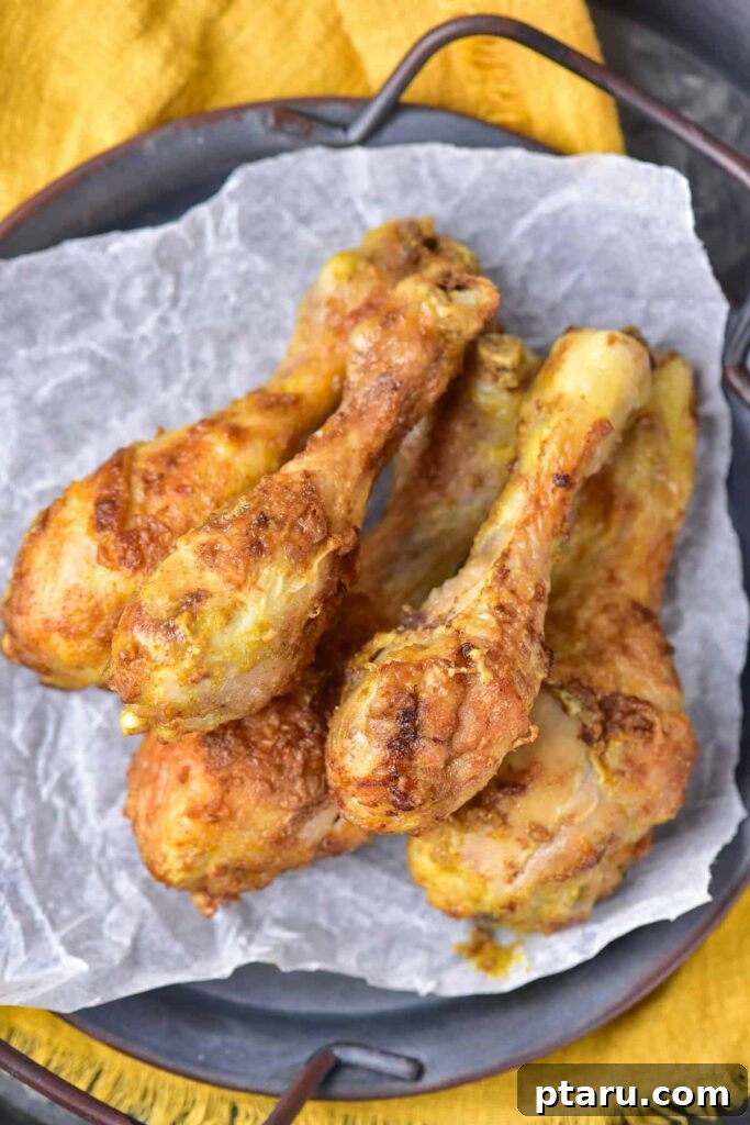 41 Succulent Chicken Drumstick Recipes You Can Make Effortlessly 39 Richly spiced Curried Chicken Legs, golden and inviting.
