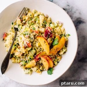 Couscous salad with a fork.