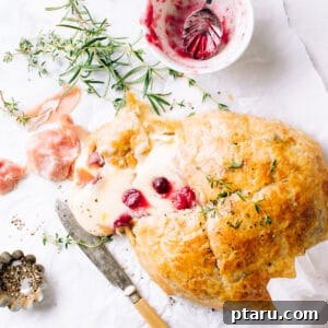 Puff Pastry Baked Brie with cranberries.