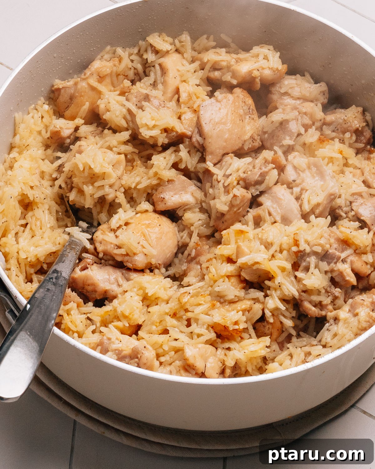 Fifteen Flavors Defining 2025 16 A comforting bowl of chicken and rice, a complete meal.