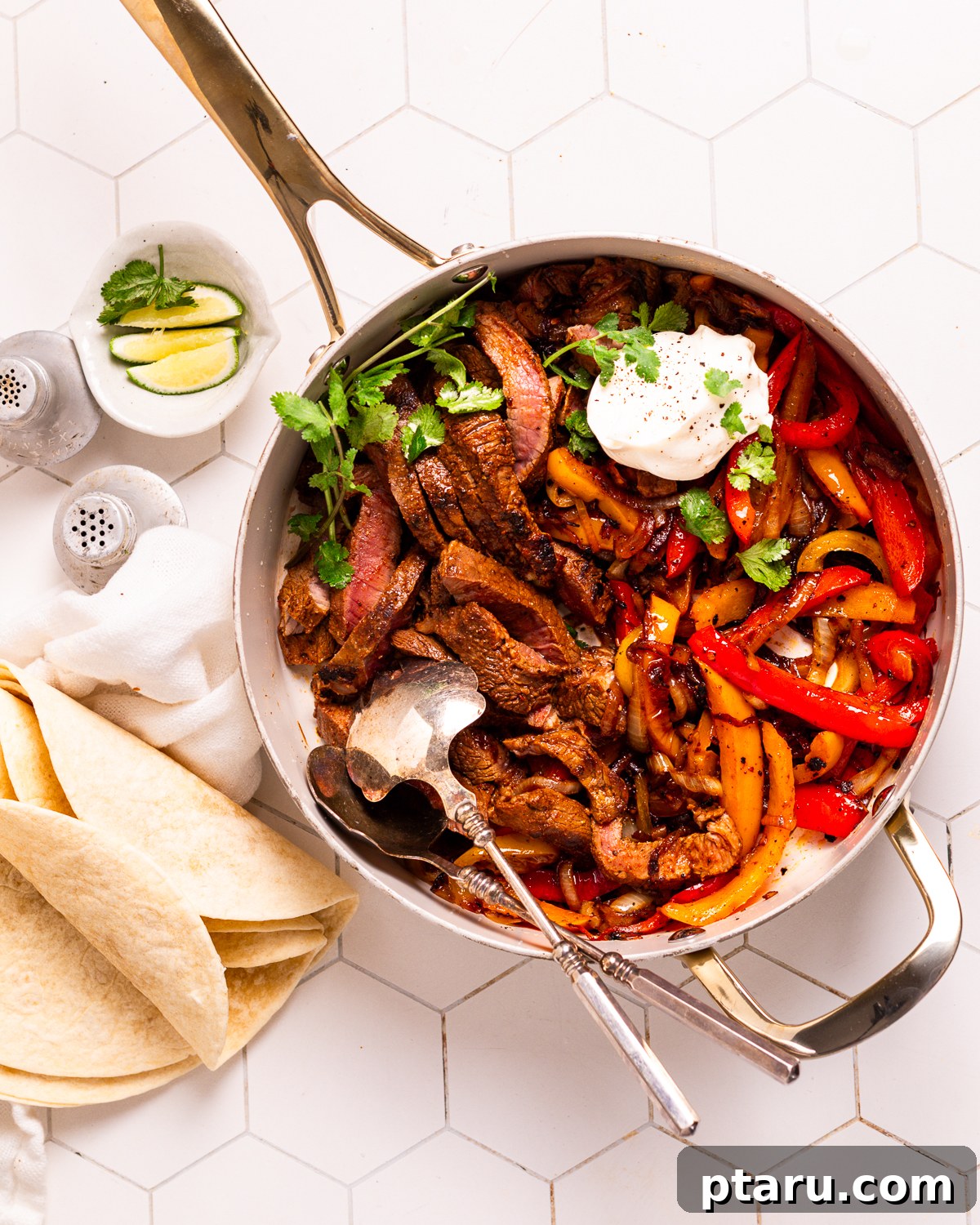 Fifteen Flavors Defining 2025 6 Sizzling Beef Fajitas with colorful peppers and onions.