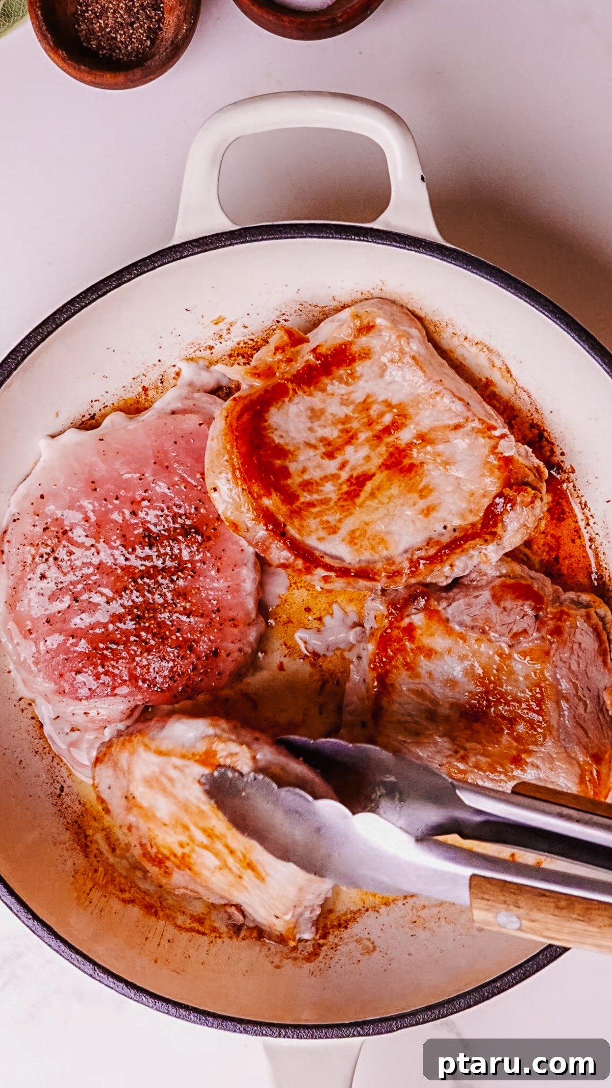 Caramelized Apple Pork Chops with Savory Sauce 5 Step 2: Sear the pork chops until golden brown on both sides.