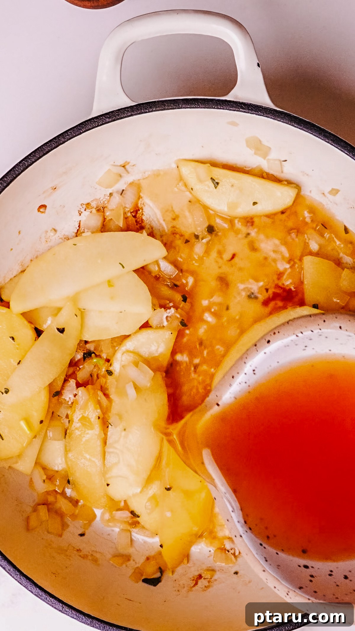 Caramelized Apple Pork Chops with Savory Sauce 7 Step 4: Add garlic and sage to the cooked apples and onions.