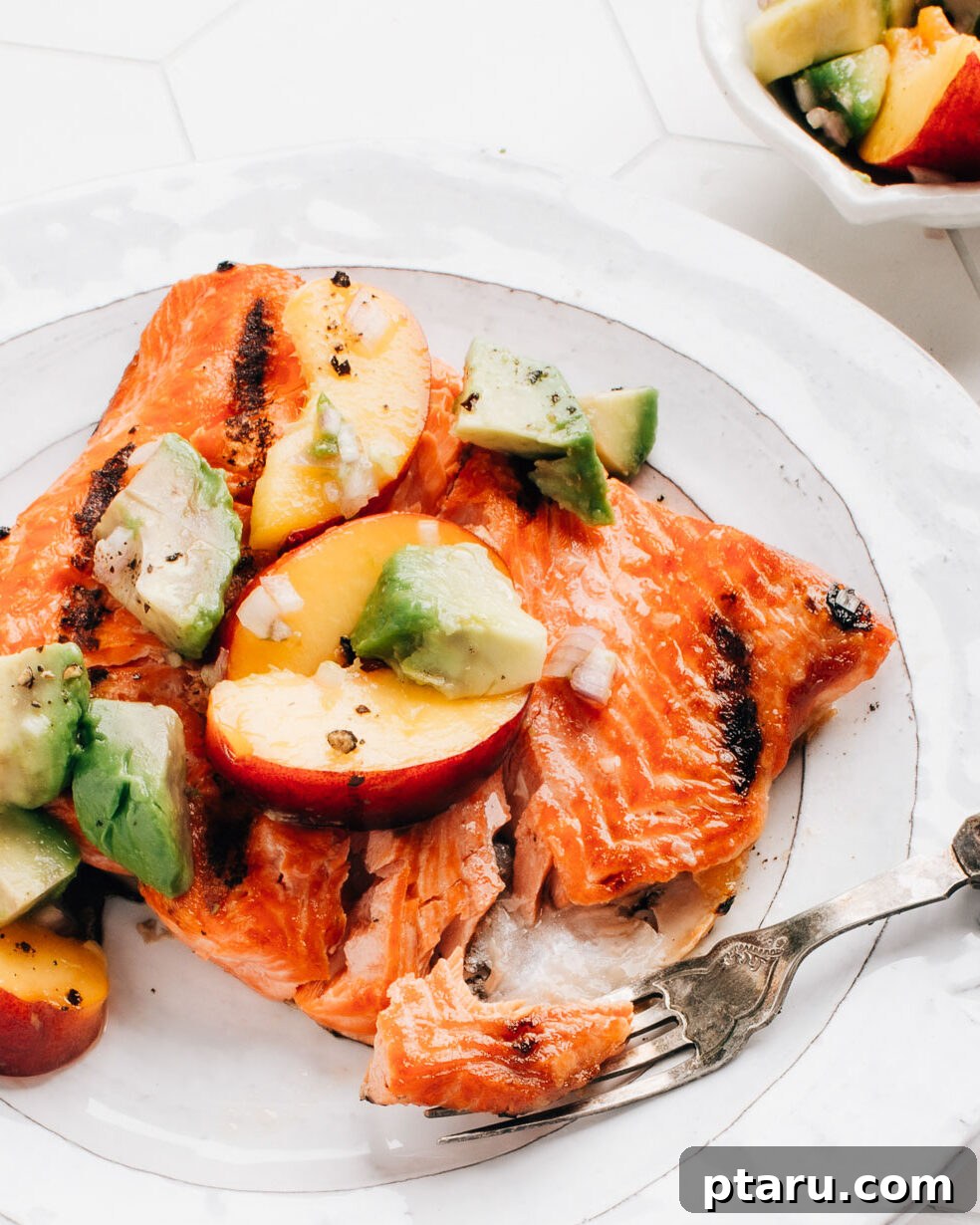 Succulent Grilled Salmon 2 Grilled Salmon topped with Avocado Salsa.