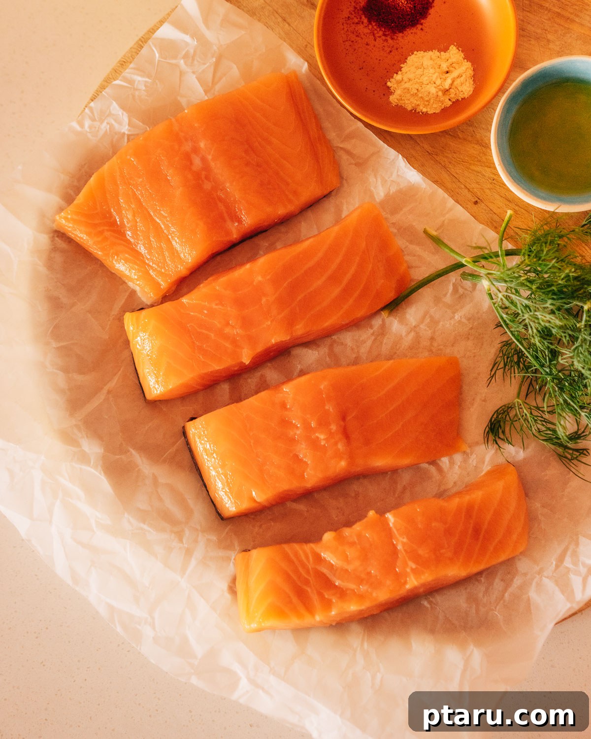 Succulent Grilled Salmon 3 Ingredients for grilled salmon on a counter.