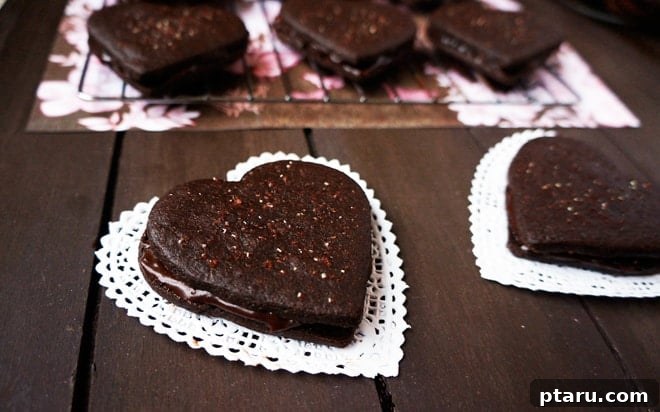 Valentines Sweet Indulgences 3 Valentine's Day heart-shaped chocolate sandwich cookies.