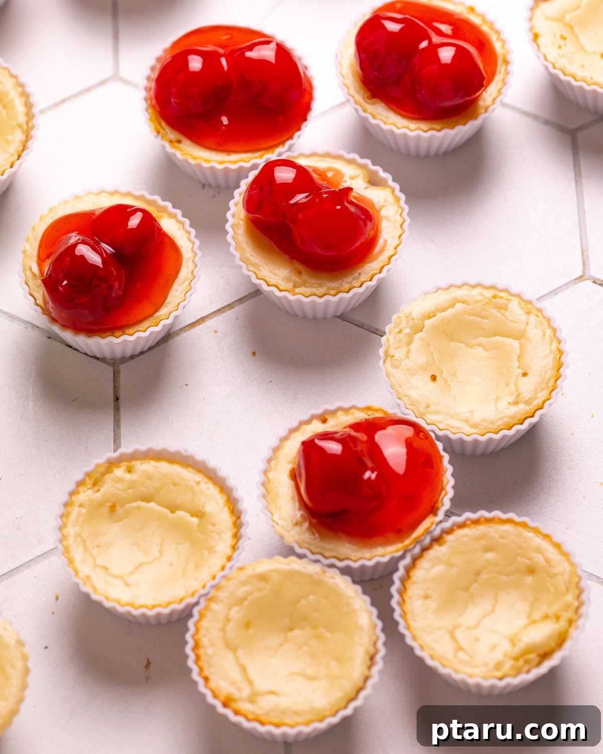 Valentines Sweet Indulgences 10 Mini cheesecake bites in liners, some topped with cherry filling.