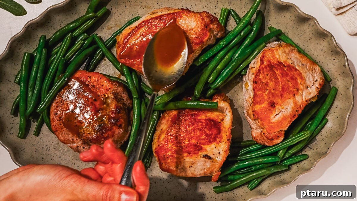Juicy Stuffed Pork Chops with Luscious Pan Sauce 9 Steps of making Stuffed Pork Chops recipe - step 6: pan sauce simmering.