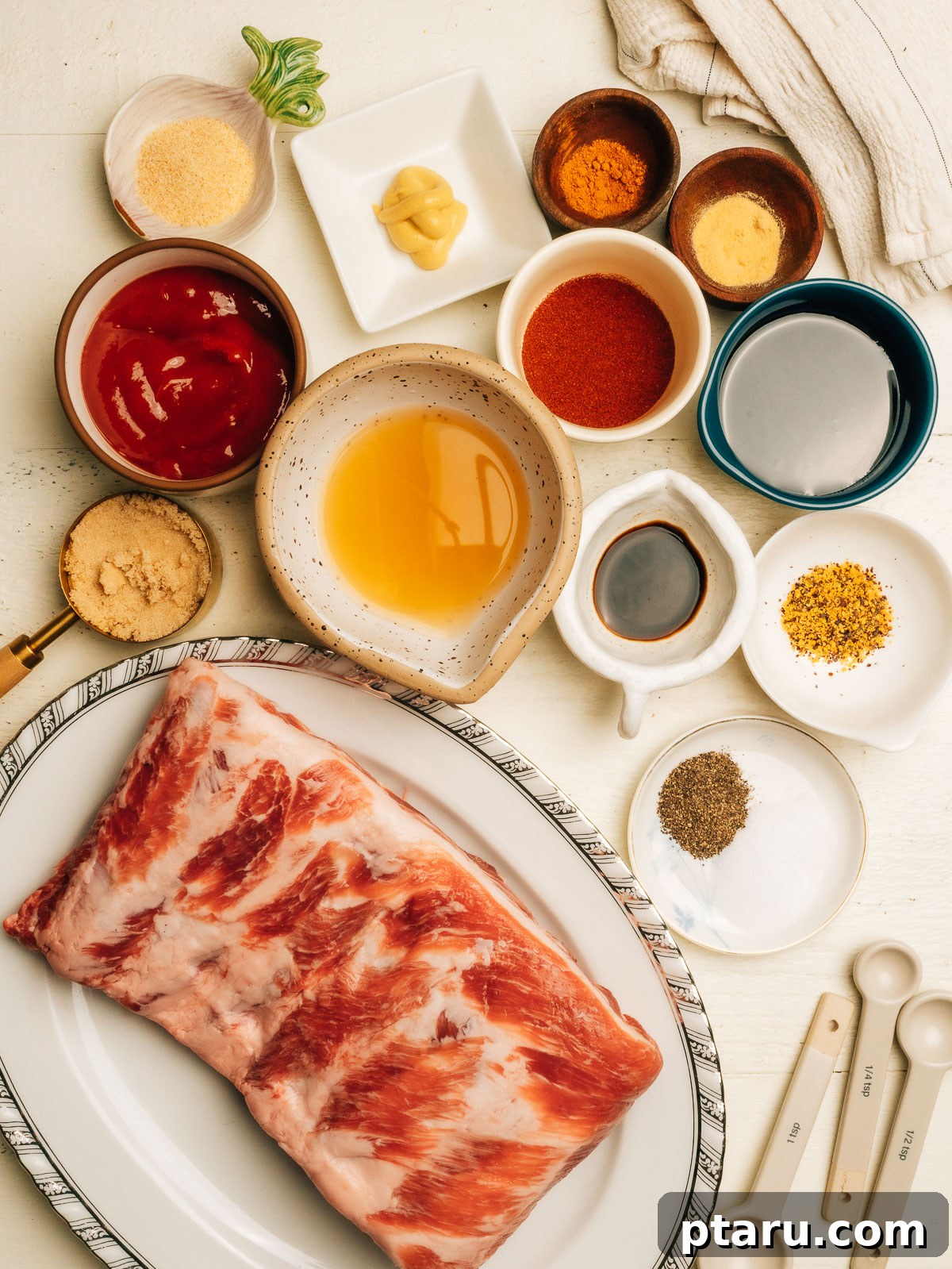 Butter-Soft Spare Ribs 3 Ingredients for Spare Ribs laid out on the counter, showcasing fresh spices and sauces.