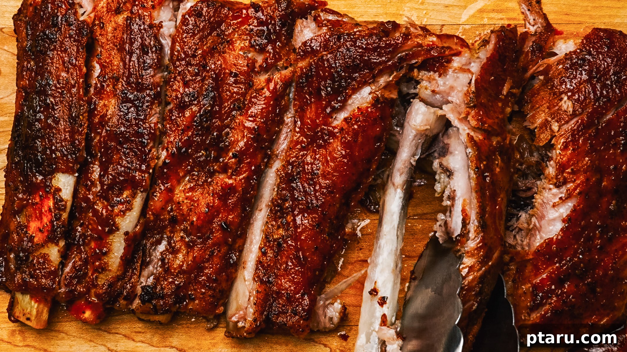 Butter-Soft Spare Ribs 9 Step-by-step photos showing how to bake spare ribs in the oven: 6. Resting and slicing the finished ribs.