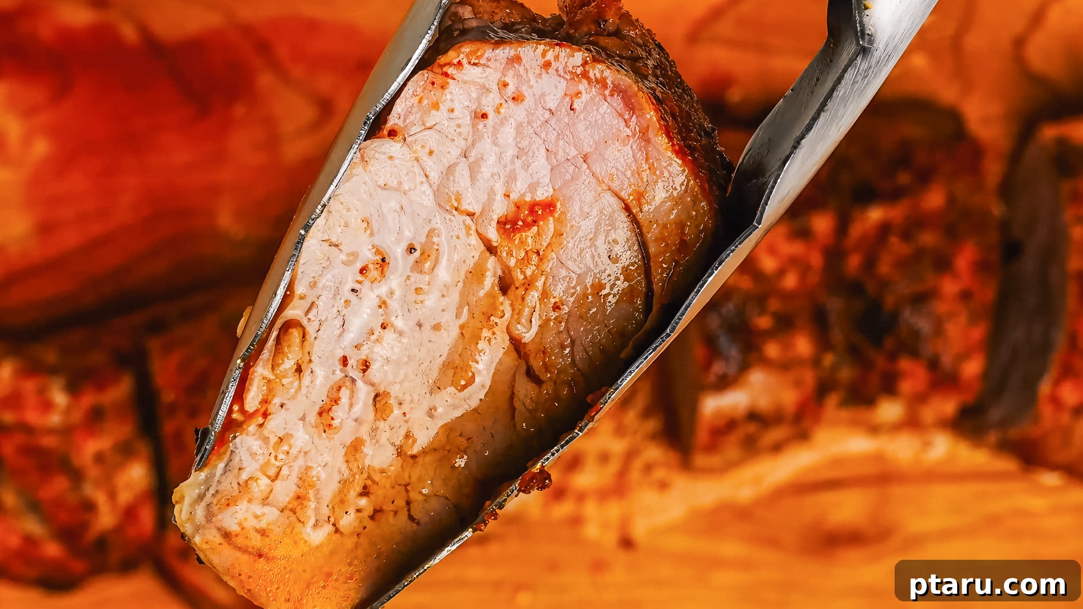 Melt-in-Your-Mouth Pork Tenderloin Recipe 4 Close up to a tender Pork Tenderloin medallion.