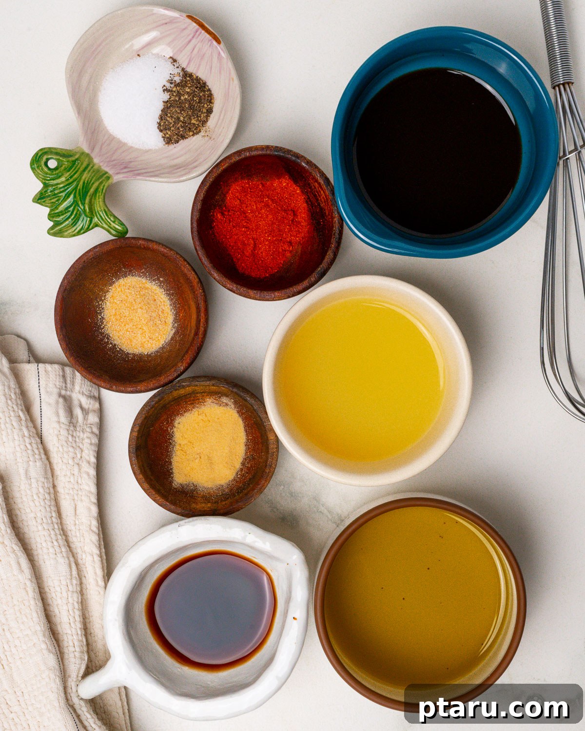 Melt-in-Your-Mouth Pork Tenderloin Marinade 3 All the pre-measured ingredients for the pork tenderloin marinade laid out meticulously on a kitchen counter, ready for mixing.