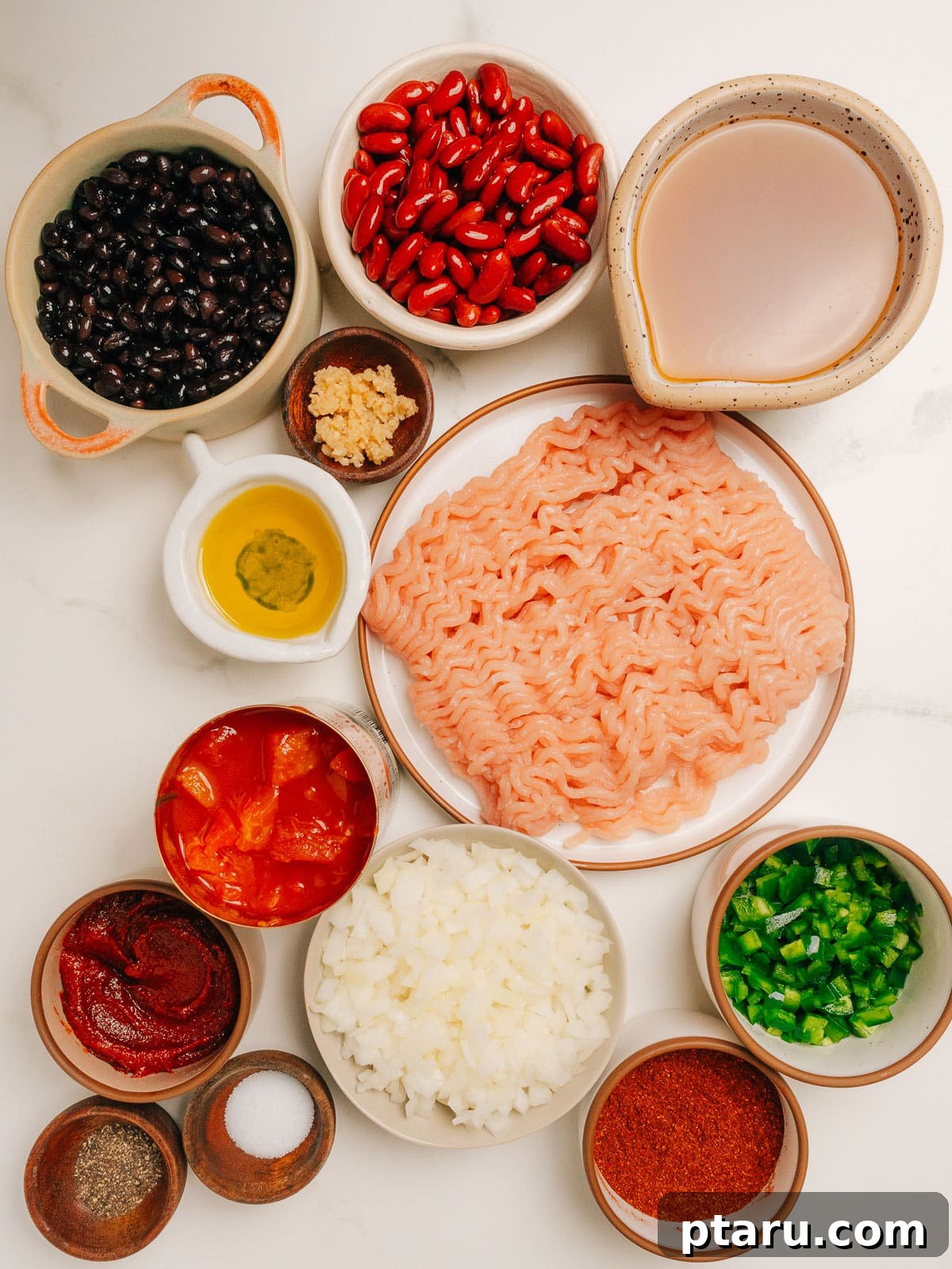 Hearty Slow Cooker Turkey Chili 3 Turkey Chili Crockpot Recipe Ingredients on the counter.