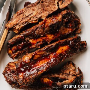 Oven baked Beef Ribs recipe finished on a plate.