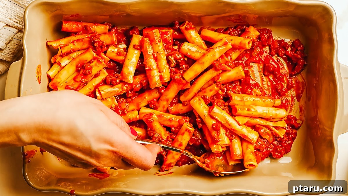 Ultimate Ricotta Ziti Bake 7 Tomato paste caramelizing in the pan