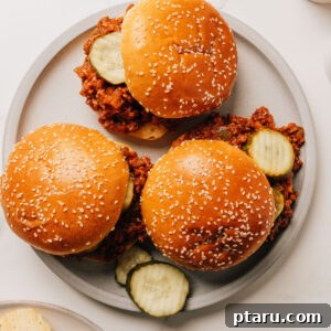 Classic Homemade Sloppy Joes Recipe: Quick Weeknight Sandwich Plan 13 Easy sloppy joes recipe in buns on a plate.