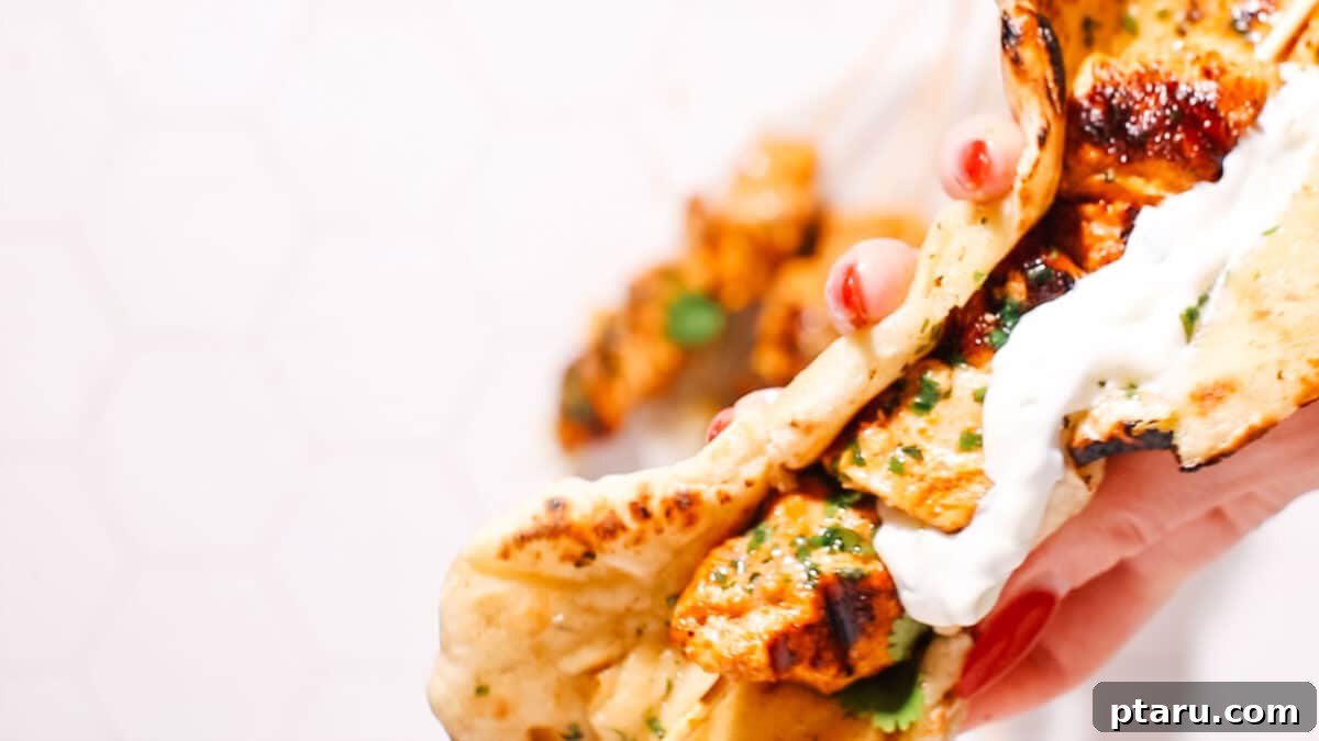 Juicy Turkey Tikka with Cooling Cucumber Raita 6 Tikka kebab in naan bread with raita.