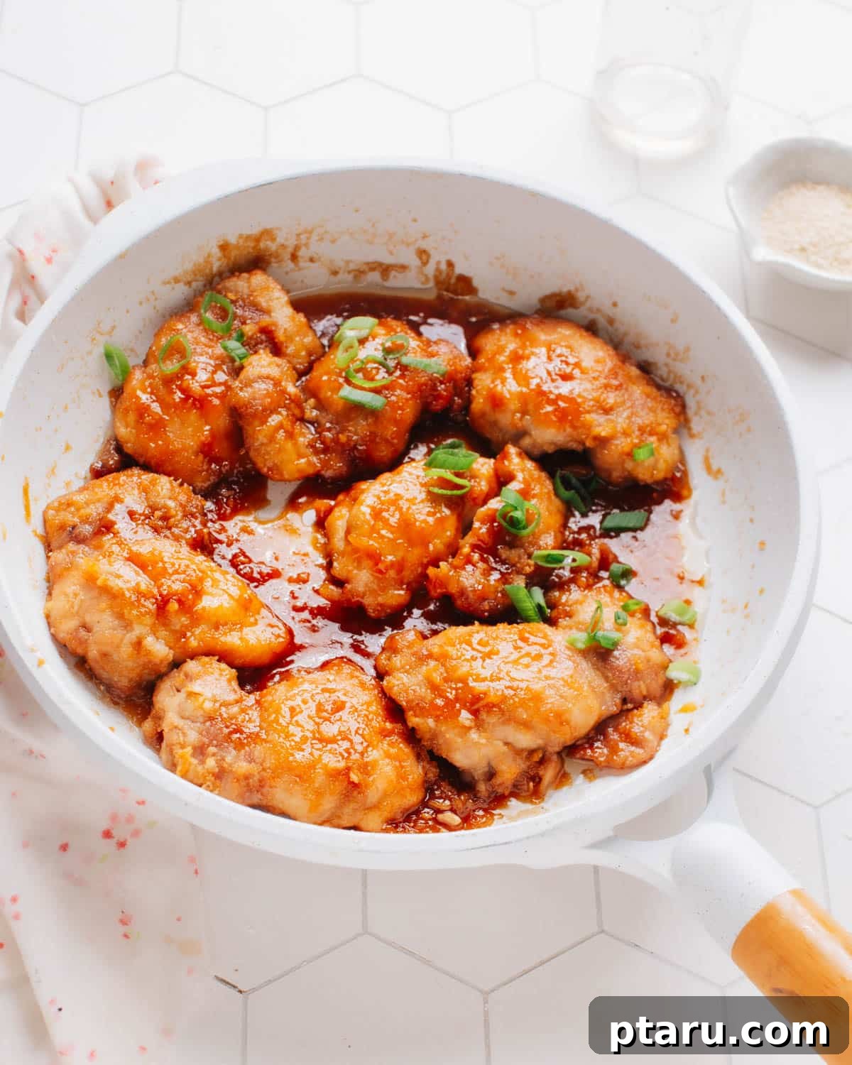 30 One-Pan Chicken Dinners: A Month of Simple Recipes 6 Garlic ginger chicken in a glossy sauce.