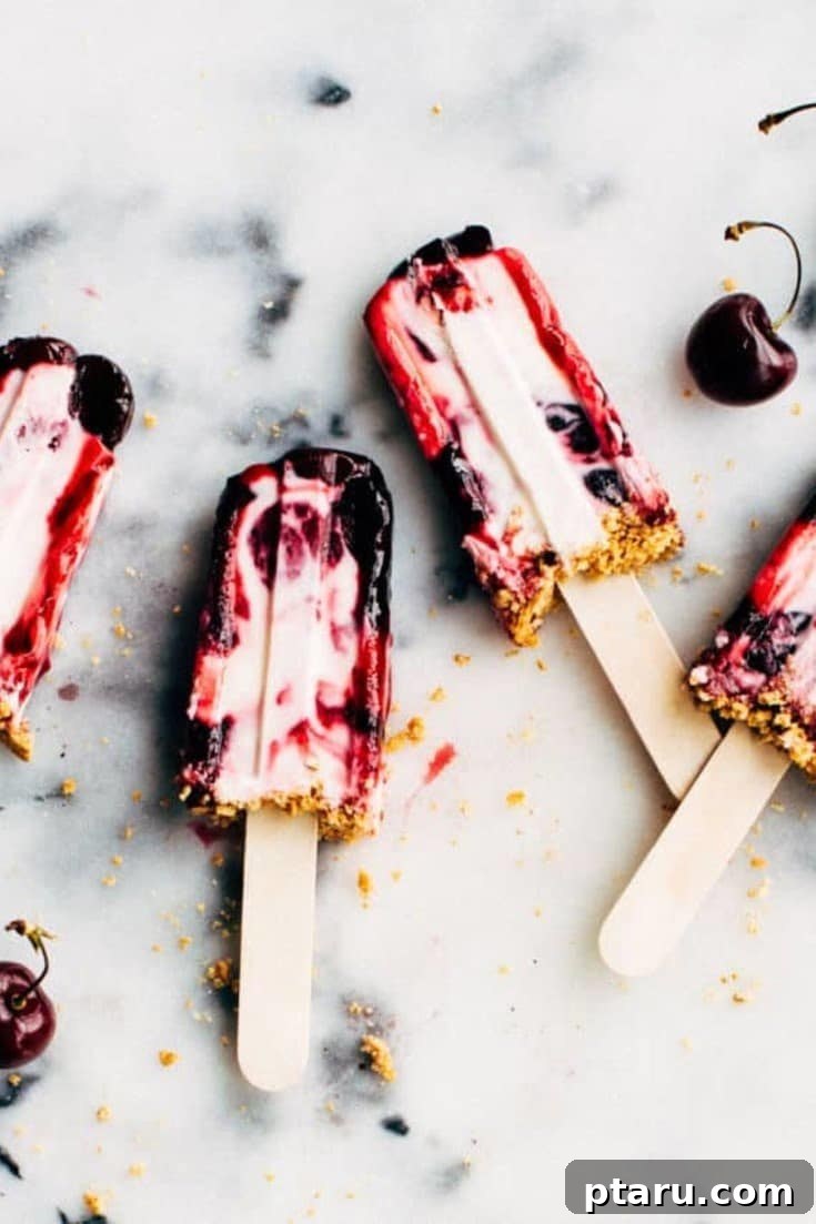 18+ Homemade Frozen Treats: Popsicle and Ice Cream Recipes 4 Cherry cheesecake popsicles with a graham crumble.
