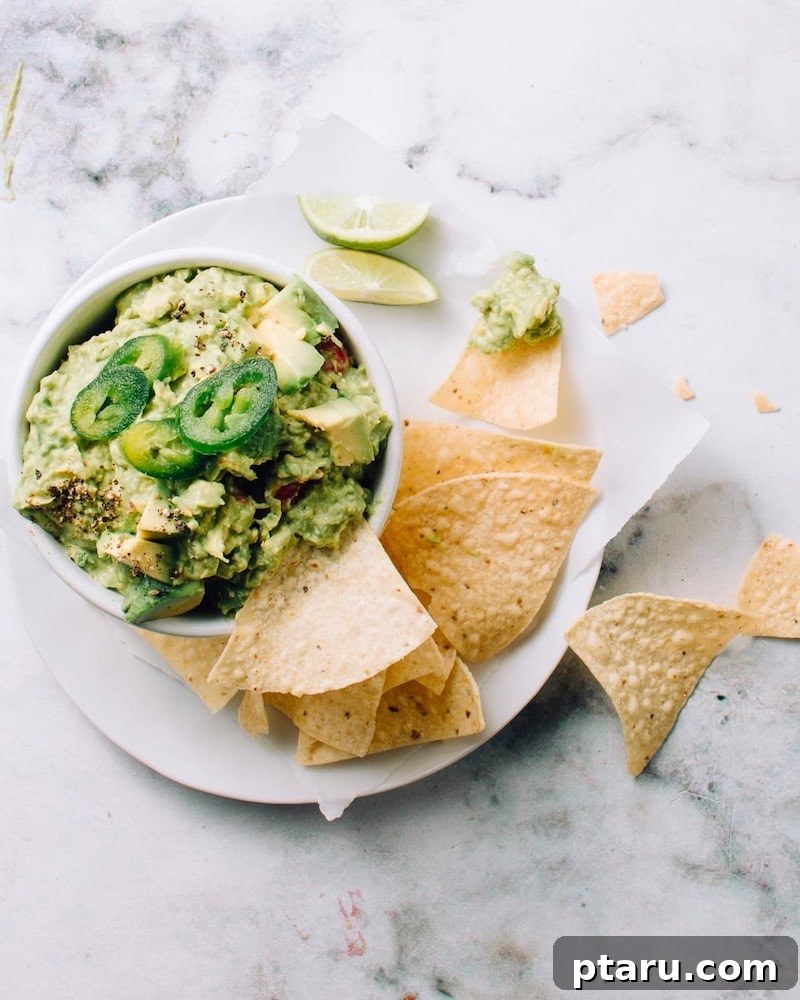 4th of July Appetizer Ideas for Patriotic Gatherings 2 Bowl of easy authentic guacamole with lime and cilantro.