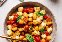 Crispy Gnocchi Caprese Salad with Pesto Dressing