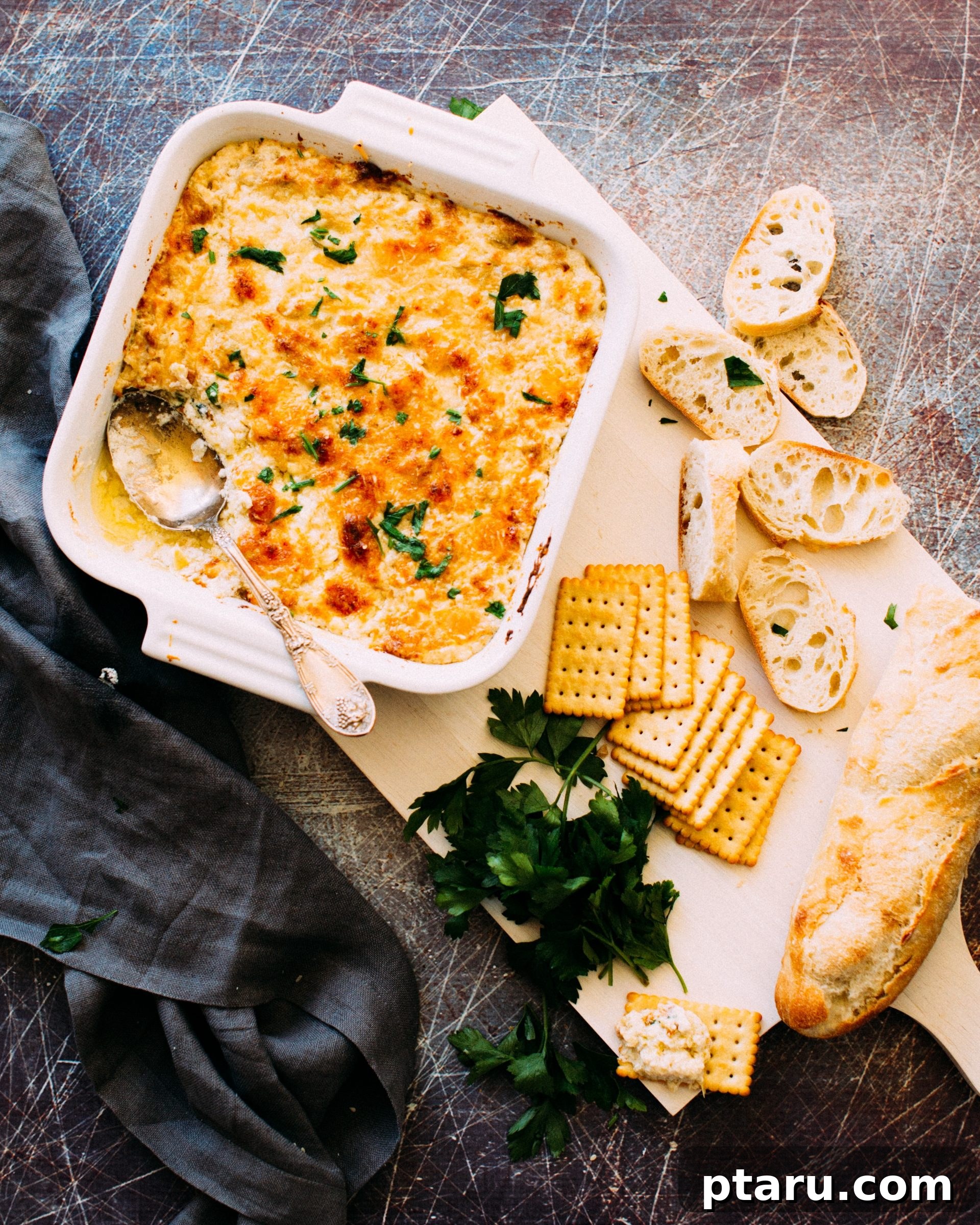 Hot artichoke and shrimp dip with toasted bread.