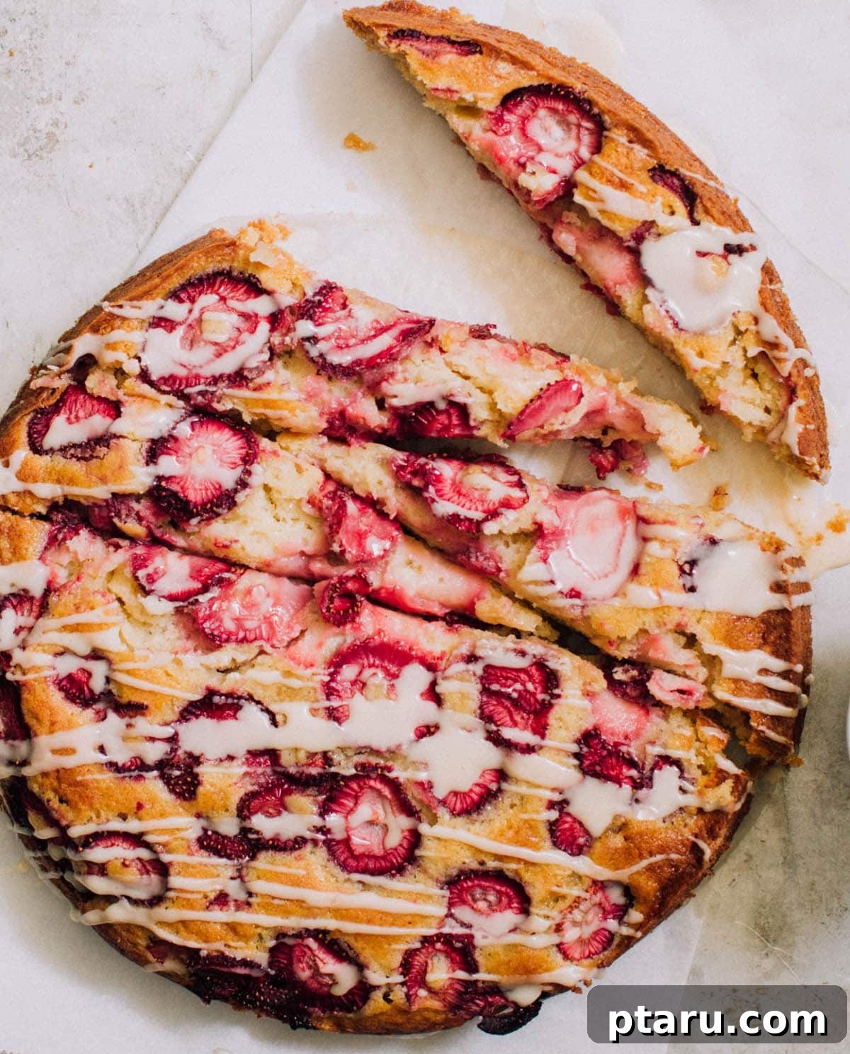 Strawberry buttermilk cake topped with berries.