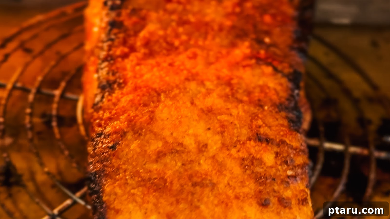 Slow-Roasted Pork Belly with Crispy Crackling 9 Pork belly skin puffed and blistered amber in the oven.
