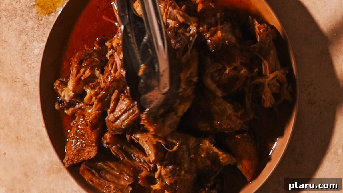 Pulled Pork Shoulder Dry Rub Recipe for Smoky Flavor 7 Spiced pork shoulder ready to cook.
