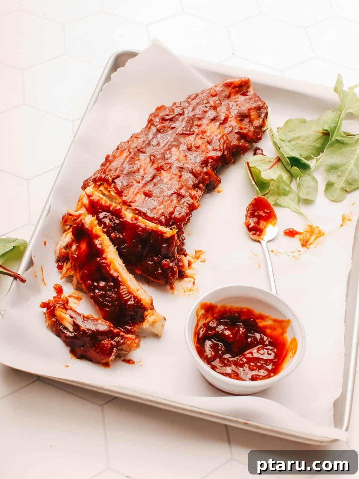 Sweet Dry Rub for Ribs: Flavorful BBQ Seasoning 8 Sticky spicy ribs on a plate, made with the cayenne dialed up in the rub.