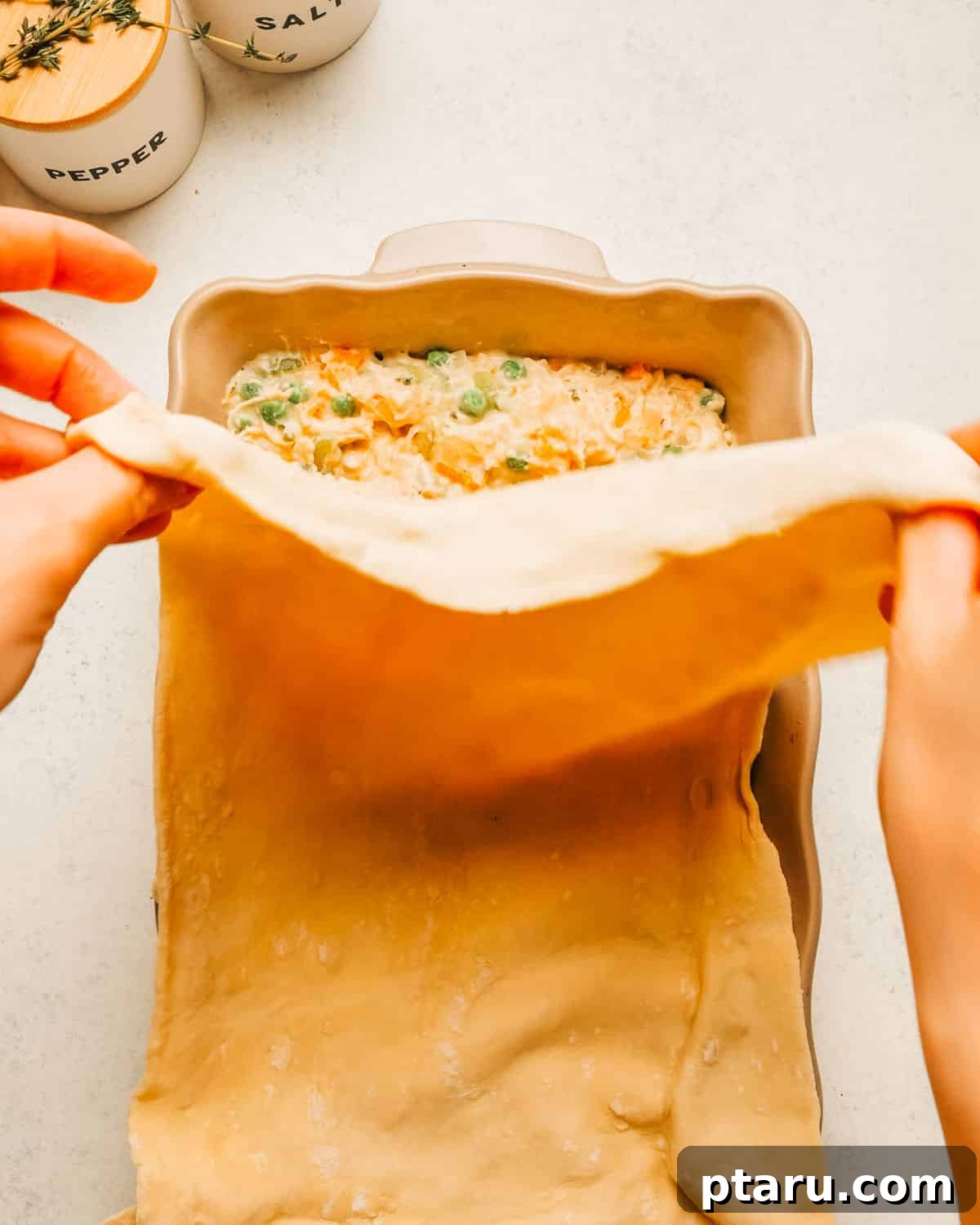 Creamy Chicken Pot Pie Casserole with Flaky Puff Pastry 11 Chicken Pot Pie Casserole recipe steps.