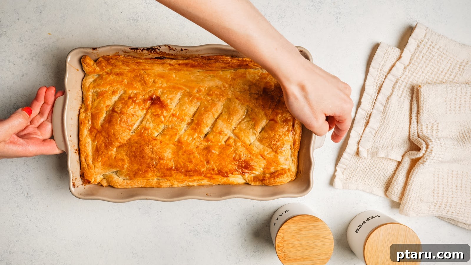 Creamy Chicken Pot Pie Casserole with Flaky Puff Pastry 13 Chicken pot pie casserole baked until the puff pastry is deep golden brown.