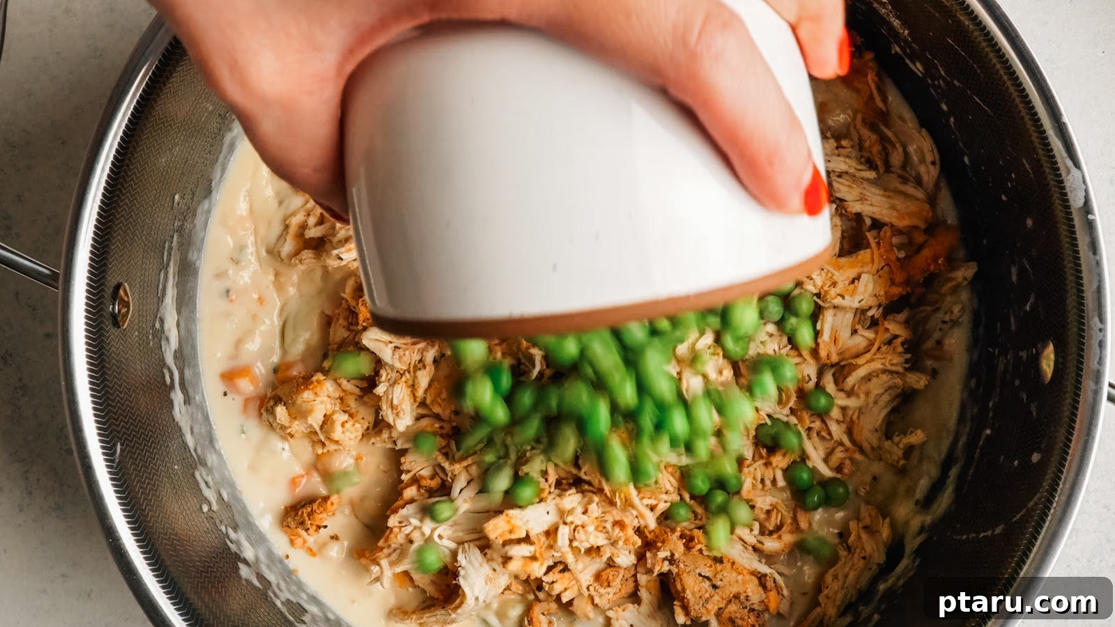 Creamy Chicken Pot Pie Casserole with Flaky Puff Pastry 9 Chicken Pot Pie Casserole recipe steps.