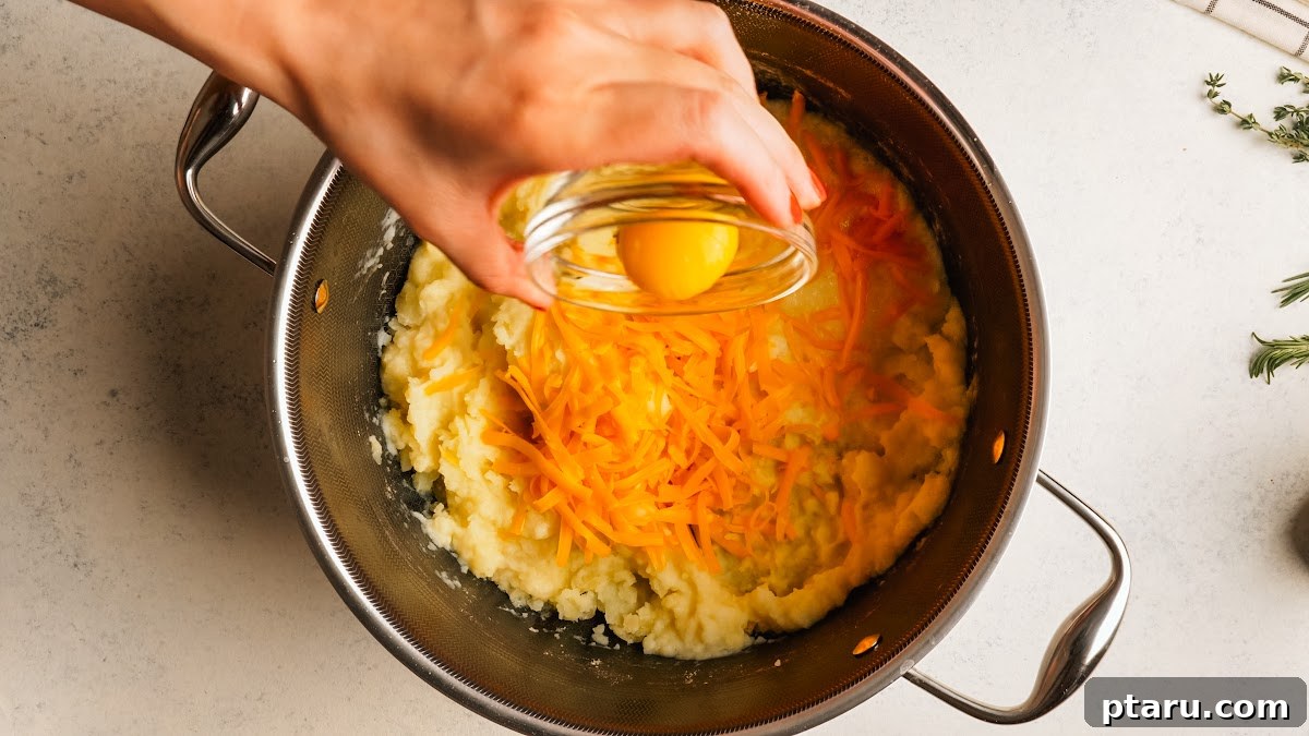 Classic Shepherd's Pie with Ground Beef or Lamb 11 Adding an egg yolk to the mashed potatoes.